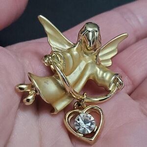 Gigi gold tone guardian angel brooch